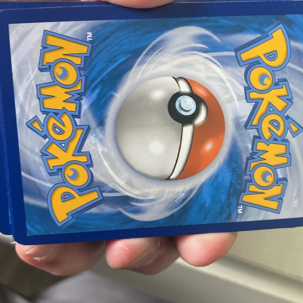 Pokemon Trading Cards Assortment - Blue, Yellow, Pink, Green